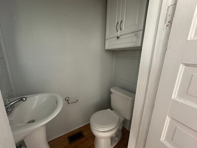 downstairs half bath - 262 Roper St