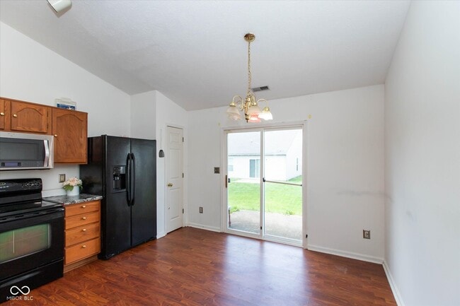 Building Photo - 7136 Pluto Dr