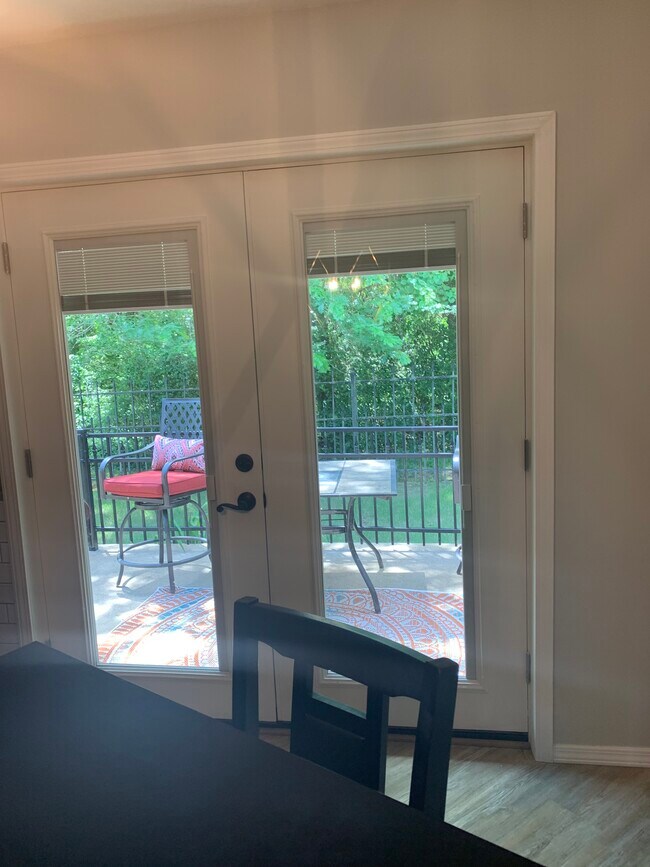 Private patio, coffee time watching the park activities and birds - 614 Cooper Estates Dr