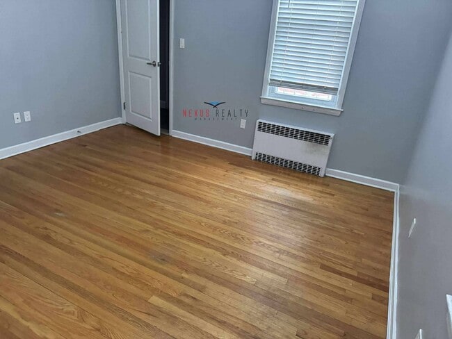 Building Photo - 21-44-44 71st St