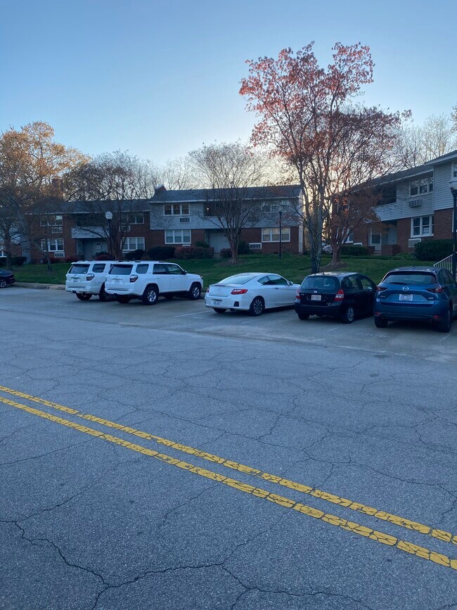 DEDICATED PARKING WITH UNIT IN THE BACKGROUND - 703 Daniels St