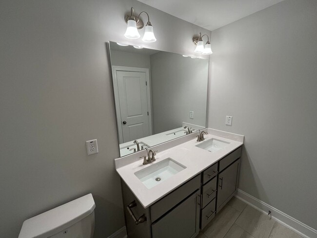 Building Photo - Newly Built 4BD, 3BA Cary Townhome with Modern Amenities and Screened-In Patio