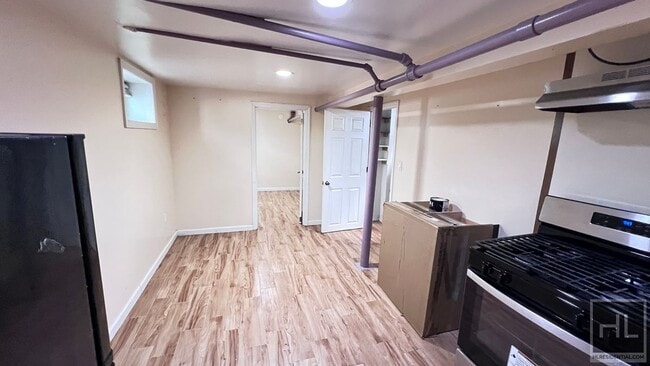 Building Photo - NEWLY RENOVATED 1 BEDROOM SEMI-BASEMNT  EA...