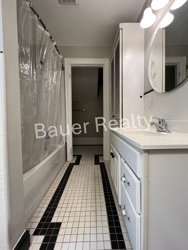 Building Photo - Three bedrooms, one and a half baths