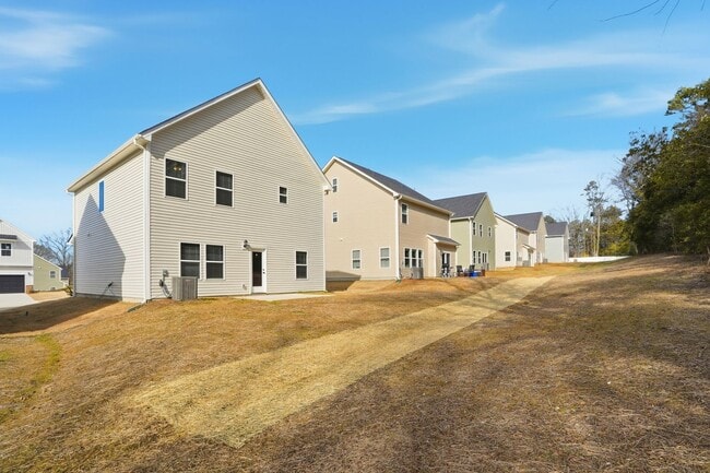 Building Photo - Brand New 4BR Home in The Pines at Paw Creek – Modern Design