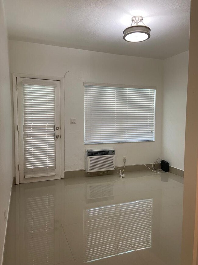Building Photo - 6498 Collins Ave