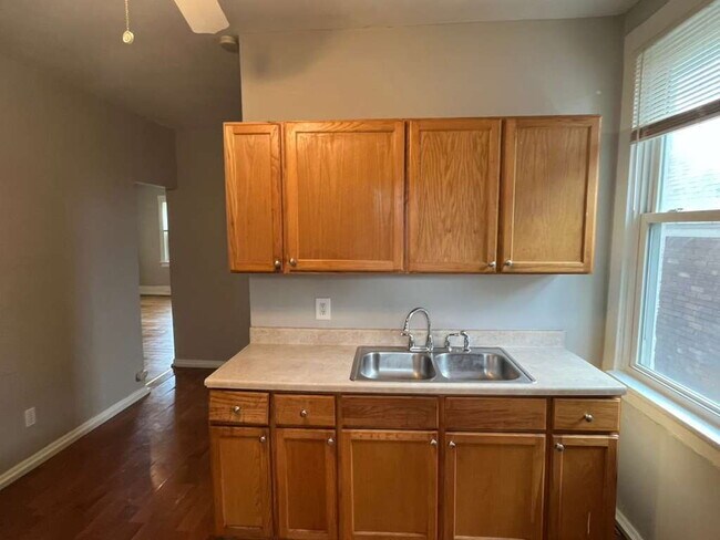 Building Photo - "Charming 2-Bedroom Retreat with Wood Floors with Basement!"