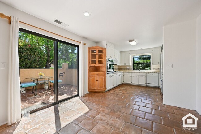 Building Photo - Southwestern Charm Meets Modern Comfort — 2BR/2BA Condo with Access to Shared Pool!