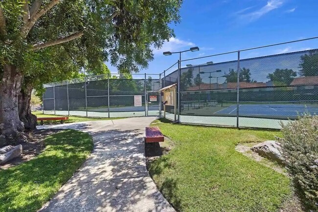 Building Photo - Upgraded La Costa Townhome