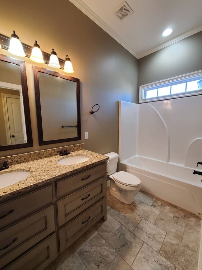 Building Photo - Spacious 4-Bedroom Home with Open Layout, Granite Finishes & Fenced Yard