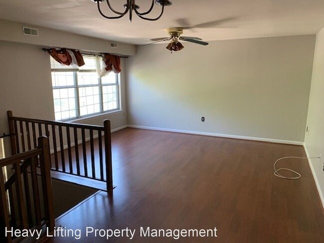 Building Photo - 3 br, 2.5 bath House - 6105 Spring Knoll Dr