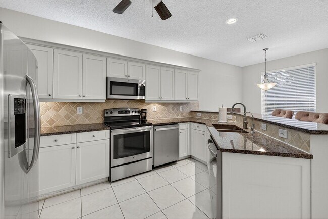 Building Photo - 6468 NW 78th Pl