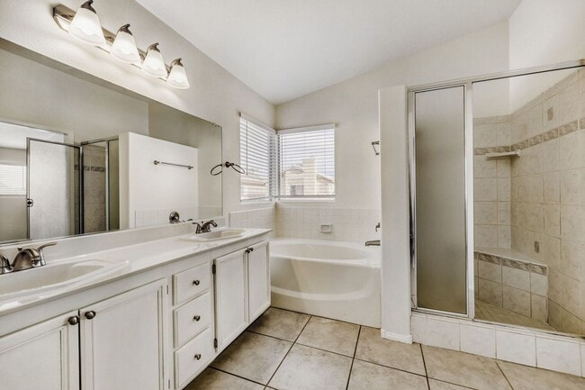 Building Photo - Fully remodeled!  Cozy 4 bedroom with 3 car garage !