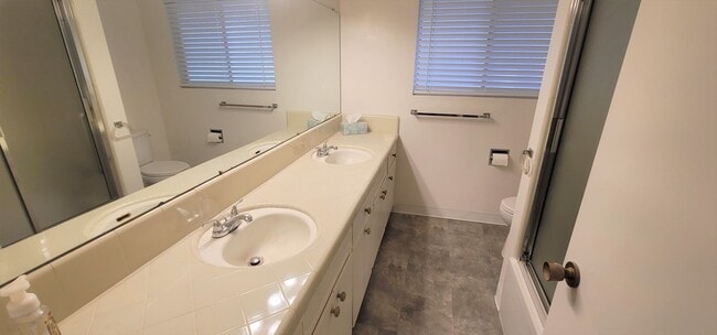 Building Photo - Classic, Midcentury 3 bedroom with Den, 2.5 bath home nestled into hillside with secluded backyar...