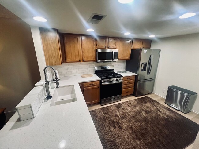 Building Photo - Affordable Comfort in 55+ Guard-Gated Comm...