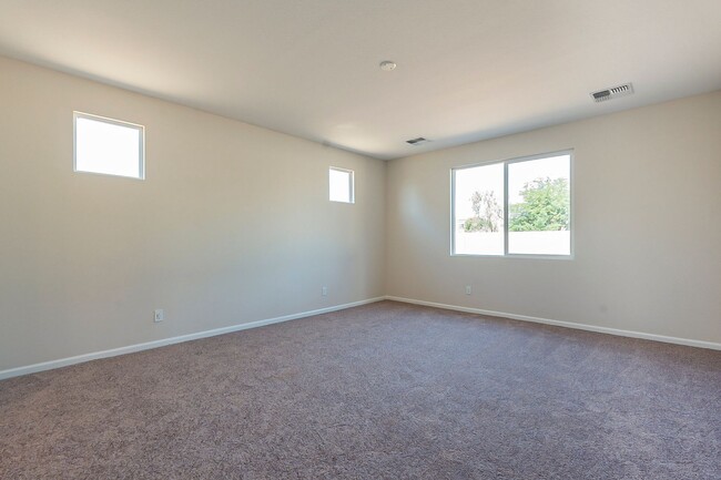 Building Photo - Beautiful New Spacious Home Includes 3 car...