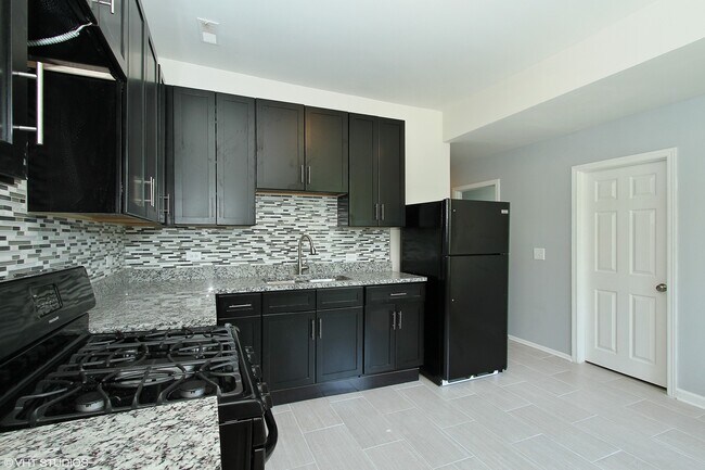 Building Photo - 6422 S Rhodes Ave