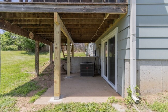 Building Photo - Charming 3BR Home-Screened Porch, Private Garage & Massive Backyard