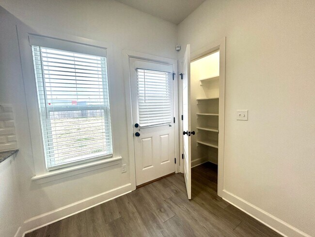 Building Photo - Centerton Home Available NOW! 4 bed, 2 full bath no carpet home. LARGE fenced backyard