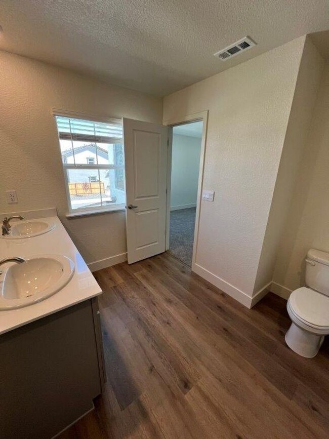 Building Photo - Brand New Three Bedroom Spanish Springs...