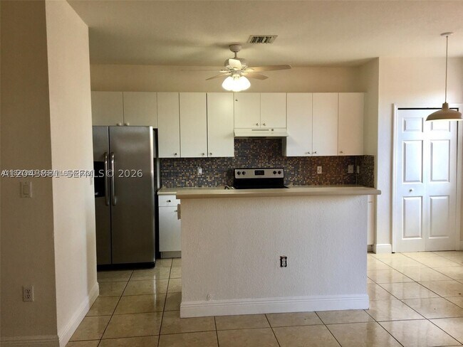 Building Photo - 24355 SW 109th Ct