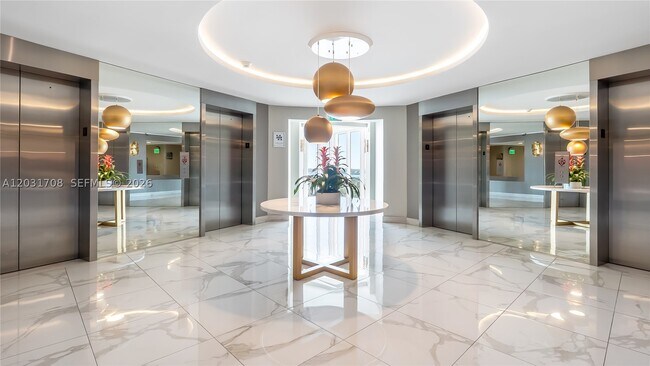 Building Photo - 10275 Collins Ave