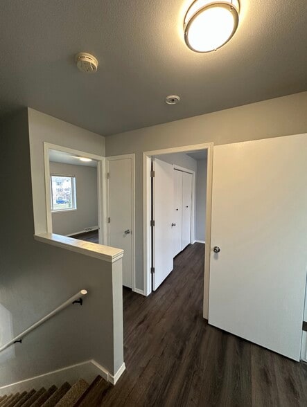 Facing the two bedrooms from the master room door. Full shared bathroom to the right. - 1507 Glacier Hill Dr