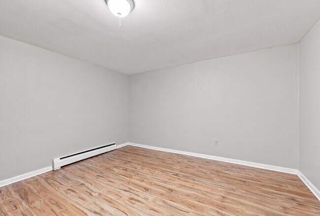 Building Photo - AVAILABLE NOW  Spacious 4-Bedroom Wheat Ridge Home with Finished Garden Level, Two-Car Garage & B...