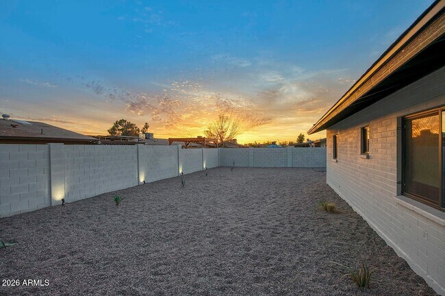 Building Photo - 8015 W Roma Ave