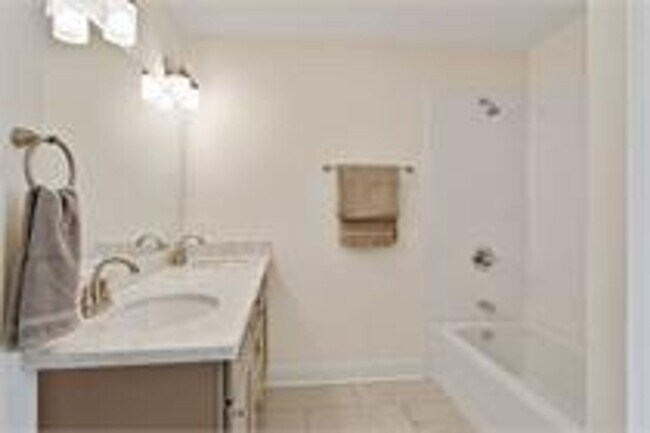 Building Photo - Renovated Central City Home with Open Floor Plan & Parking