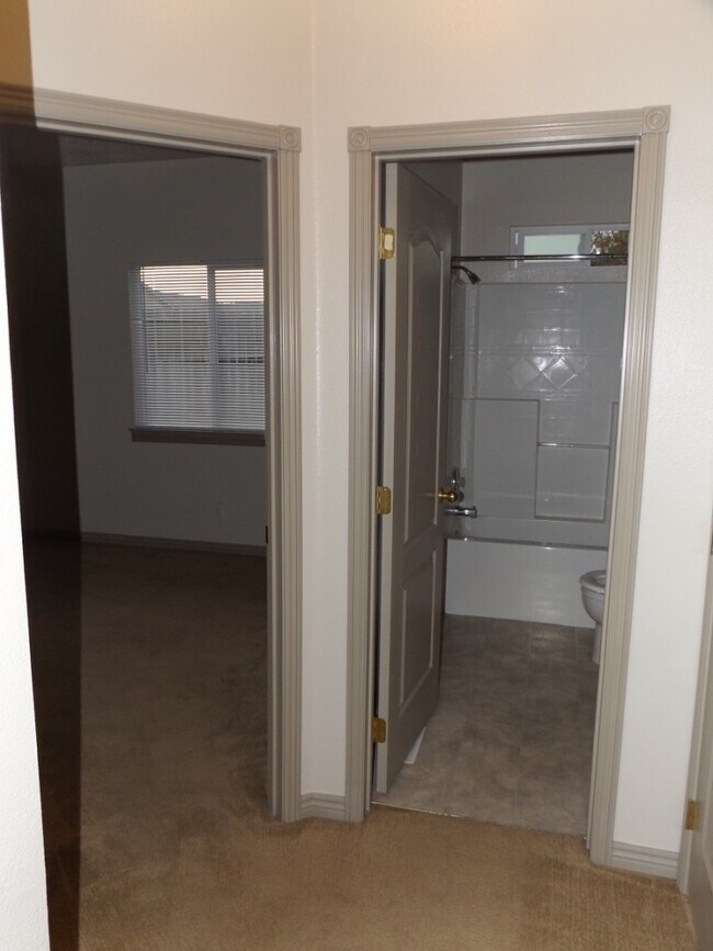 Building Photo - Spacious 3 Bedroom, 2 Bathroom Duplex with Two Car Garage and Fenced Yard!