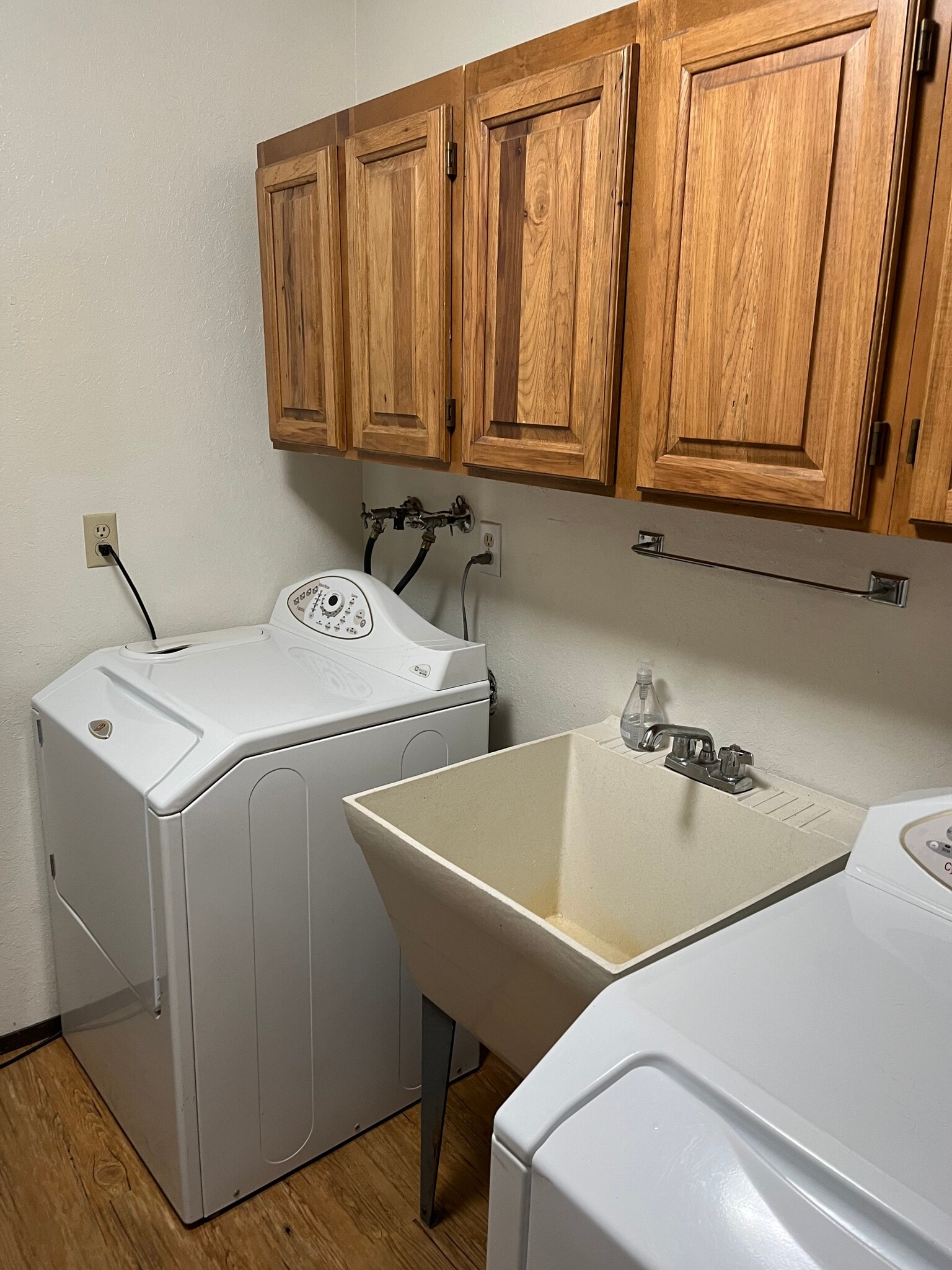 Maytag washer and dryer in mudroom with utility sink - 21020 SE 358th St