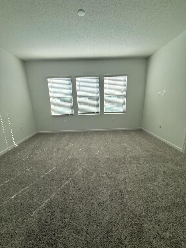 Building Photo - "Embrace Tranquil Living in this Spacious 3-Bedroom, 3-Bath Sanctuary on Zen Way!"