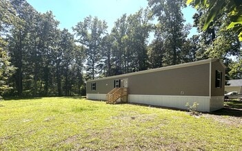 Building Photo - Brand new 4BR Mobile Home - Country living with City convenience!