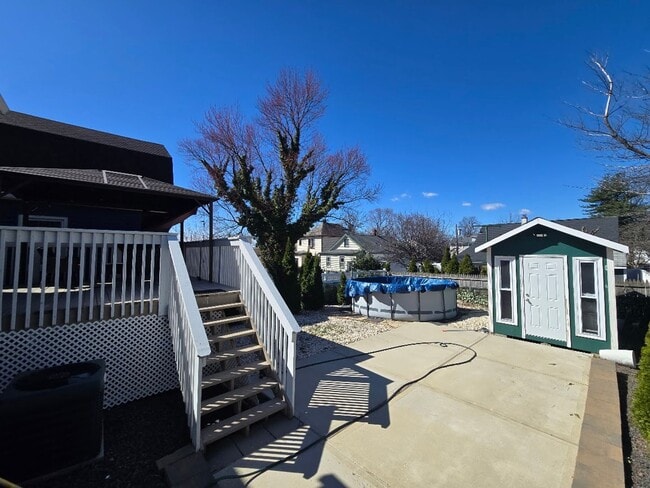 Building Photo - Spacious, meticulously renovated single family: 2-bedroom, 2 full bathroom & finished basement an...