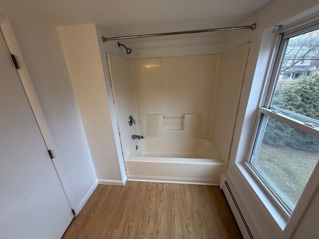 Building Photo - Economical twin home with great natural light, fresh paint, yard, creek