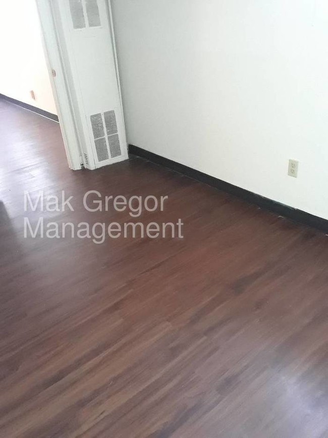 Building Photo - New Flooring, Fresh Paint, Appliances, A/C.