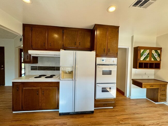 Building Photo - Charming 4-Bedroom Home on a Quiet Tree-Li...