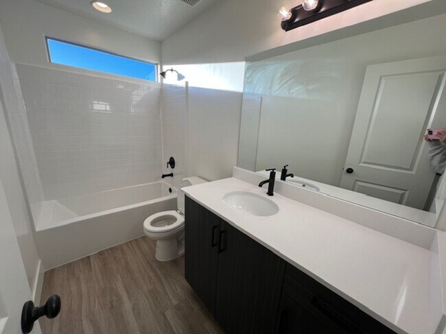 Building Photo - BRAND NEW South Desert Townhome with EVSE Outlet