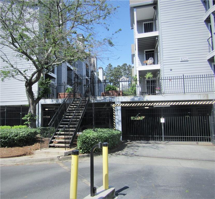 Gated garage and front entrance - 305 Granville Ct