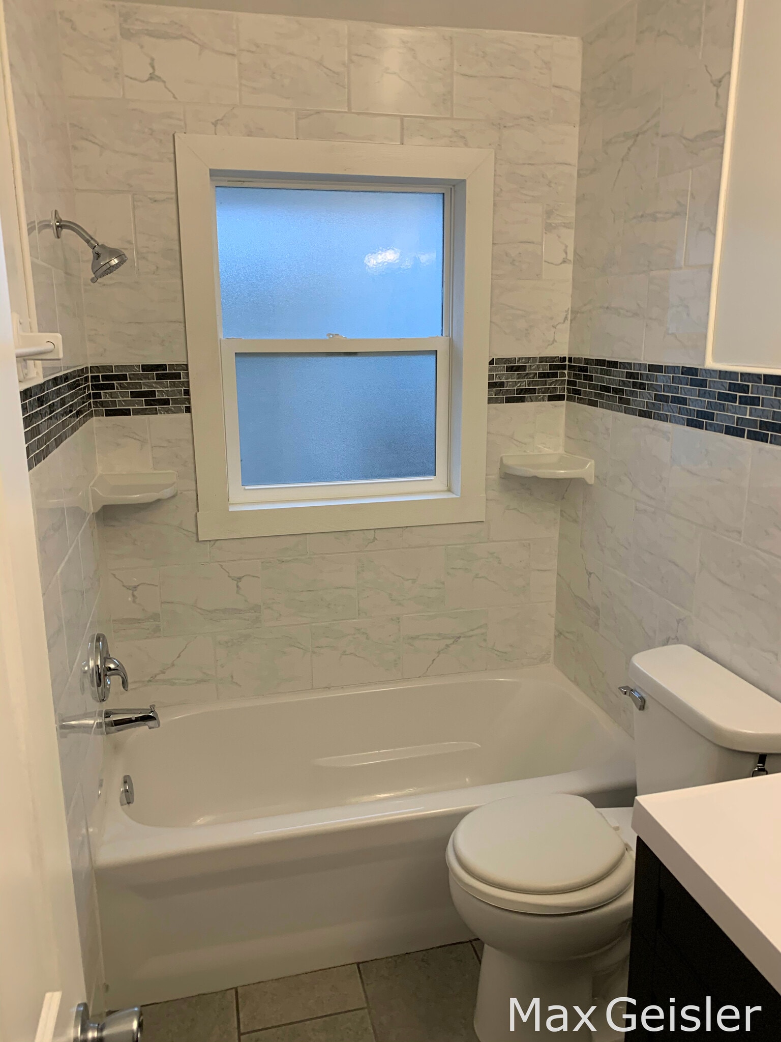 Recently updated bathroom. - 404 12th Ave N