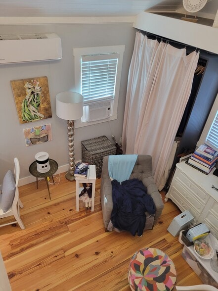 View from top of stairs. (Furniture not included) - 701 Bay Ave