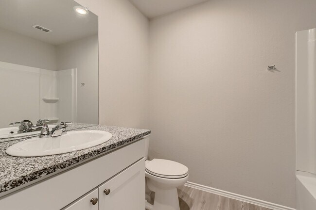 Building Photo - Beautifully Designed4-Bedroom Home with Open-Concept Living in a Prime Location