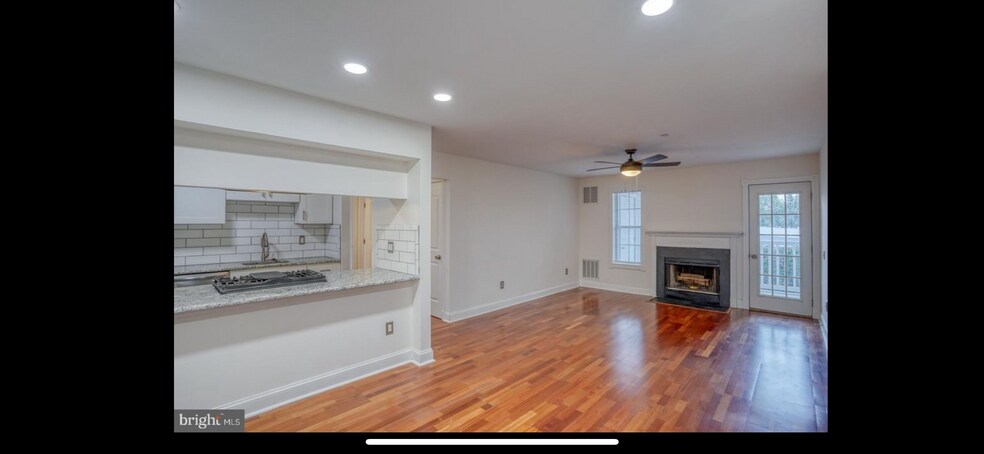 Kitchen counter and living room - 405 Waters Edge Dr