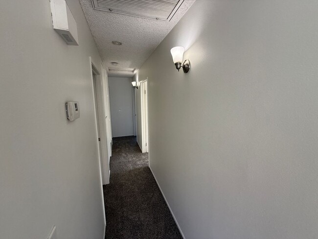 Building Photo - Charming 3-Bedroom Upper-Unit Condo in Can...