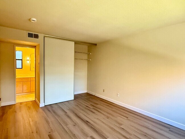 Building Photo - New Vinyl Plank Flooring, Fresh Interior Paint, 1 Car Garage + 1 Assigned Outdoor Parking Space -...