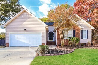 Building Photo - This lovely home is ready for your personal touch!