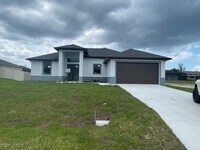 Building Photo - 2435 Tropicana Parkway W