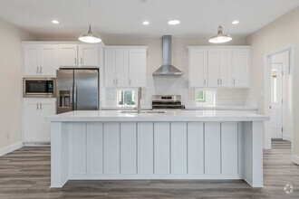 Building Photo - VERY PRIVATE BRAND NEW HOME IN THE PLEASU...