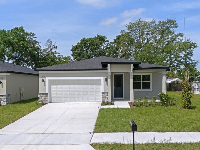 Building Photo - Available Now! Brand New 4/2 Single Family...